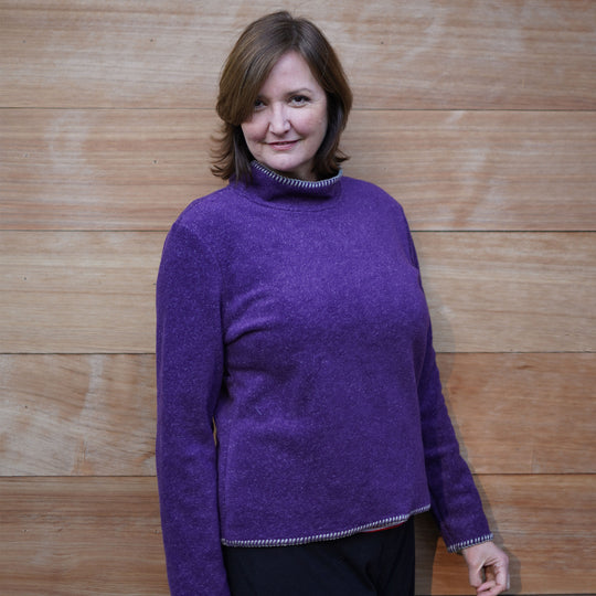 Cropped roll neck fleece sweater